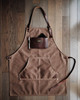 Workshop apron sewn from Saddle Brown Waxed Canvas Fabric — water-resistant, rugged cotton canvas perfect for makers and chefs